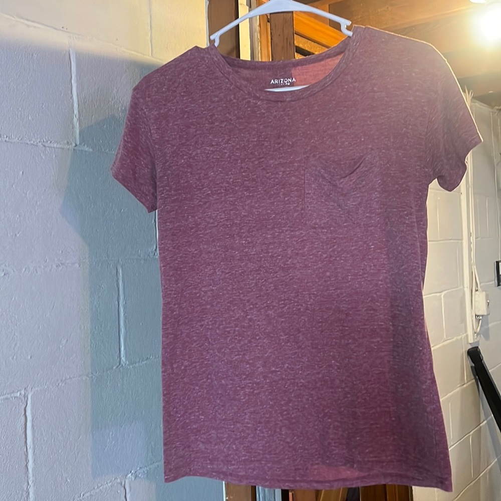 Pink tee with pocket.